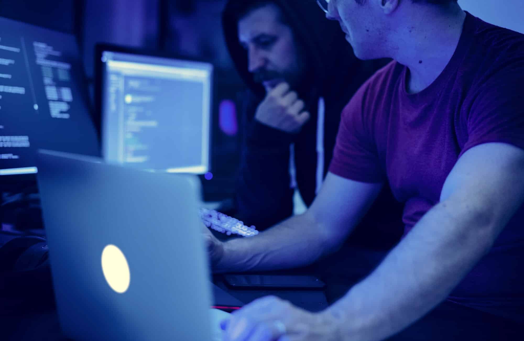Programmers working on computer program