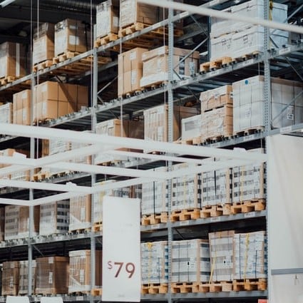 Warehouse with many shelves and boxes