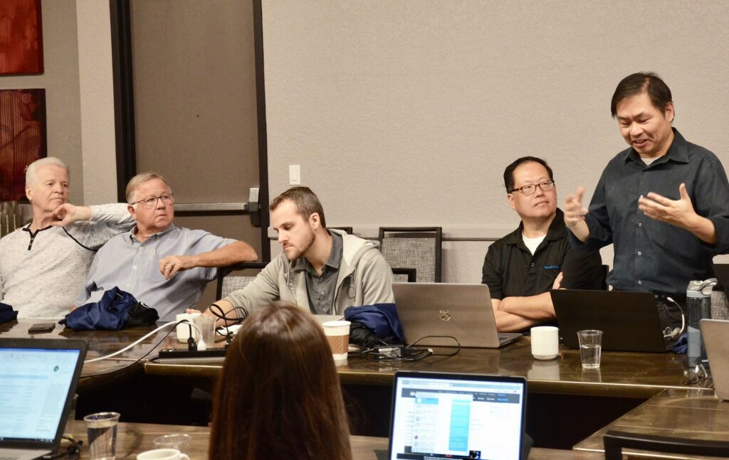 consultants talking around a table