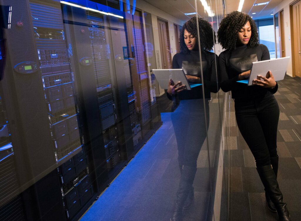woman analyst in a server room